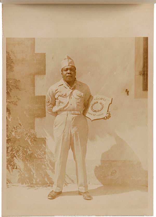 Item #WRCAM55486 604th ORDNANCE AMMO. CO. NUGOLA, ITALY AUGUST 1945 [wrapper title]. African-American Photographica, World War II.